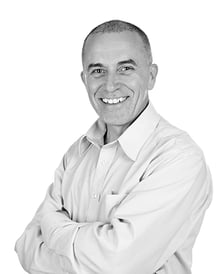 Middle age man wearing blue button up BW